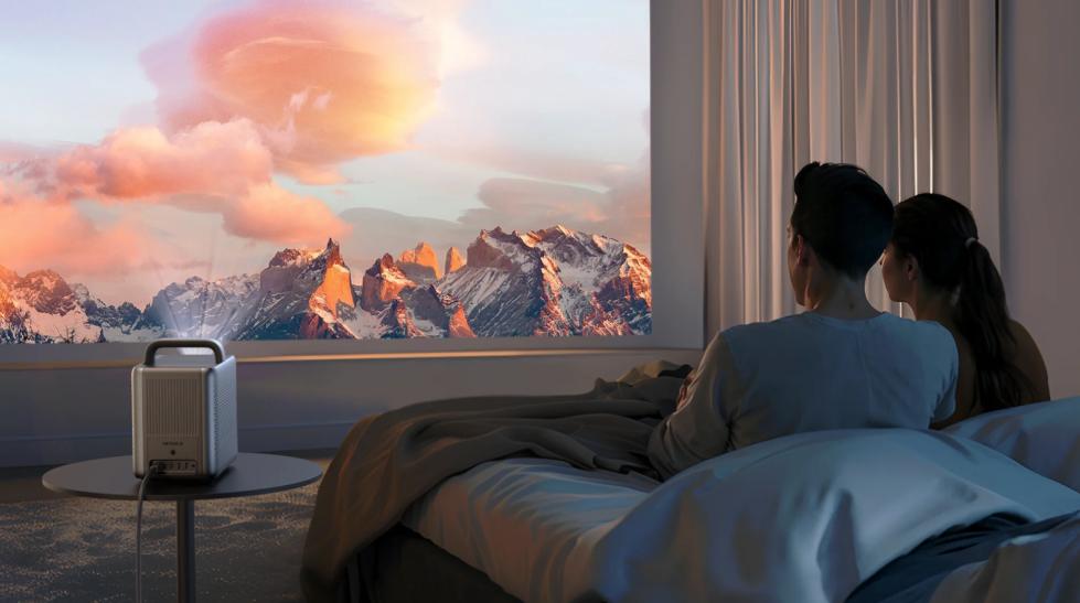 a couple watching movie with Nebula projector